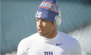  ?? CHRIS SZAGOLA/AP ?? New York Giants running back and Whitehall grad Saquon Barkley said he is determined to finish his degree at Penn State. Barkley is currently the odds-on favorite to win NFL Offensive Rookie of the Year.