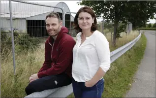  ??  ?? Principal Rory Kinane and Chair of the Board of Management Cllr Jennifer Whitmore at the site in Charleslan­d where the new Greystones Community School will be built.