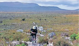  ?? | ARMAND HOUGH African News Agency (ANA) ?? A HIKER on the Cape of Good Hope Trail in the Western Cape. The 34km-long hiking trail starts at the Cape of Good Hope Nature Reserve entrance gate and loops around the best viewpoints the reserve has to offer.