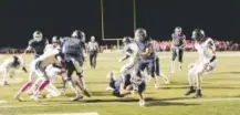  ??  ?? Valor Christian’s Joshia Davis dives for a first-half touchdown in the Eagles’ victory Friday night. Kyle Newman, The Denver Post