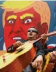  ?? Foto: dpa ?? Mit Musik ist vieles leichter: Die Mexikaner fürchten „Hurricane Trump“.