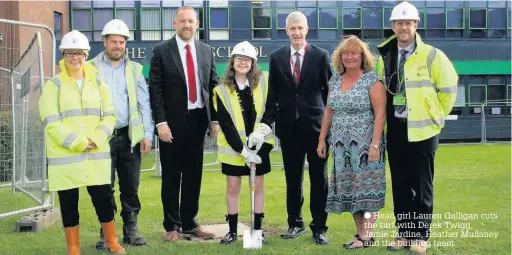  ??  ?? Head girl Lauren Galligan cuts the turf with Derek Twigg, Jamie Jardine, Heather Mullaney and the building team