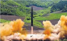  ?? ASSOCIATED PRESS ?? This photo distribute­d by the North Korean government shows what was said to be the launch of a Hwasong-14 interconti­nental ballistic missile from North Korea on July 4.