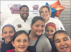  ?? SUBMITTED PHOTO ?? Chefs Jarrett Young and Maria Crann with a group of Create-a-Cook students.