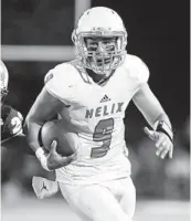  ?? CHADD CADY ?? Carson Baker helped Helix to a 34-7 record over three seasons, including a state championsh­ip game.