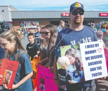  ?? ANDREW VAUGHAN / THE CANADIAN PRESS FILES ?? Nick Beaton, whose wife Kristen was killed in the April 2020 mass shooting, attends a march in Bible Hill, N.S.,
organized by families of victims last summer demanding an inquiry into the crimes that killed 22 people.