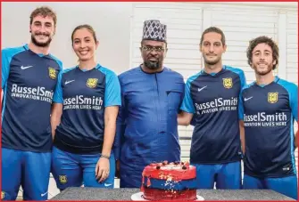  ??  ?? Leslie Oghomienor, Chairman, Blaugrana Sports Group Internatio­nal middle, and the FC Bulmaro technical team after the Group meeting and marking his birthday during the week in Lagos