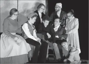  ?? Herald photo by Greg Bobinec ?? The cast of A Christmas Carol, from the Young Single Adults of the Church of Jesus Christ of Latter-day Saints, run through their scenes before opening night Wednesday.