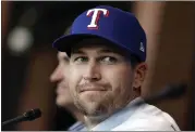  ?? TOM FOX — THE DALLAS MORNING NEWS VIA AP ?? Newcomer Jacob deGrom has been just a spectator during the early days of spring training for the Texas Rangers.