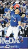  ?? CP PHOTO ?? Toronto Blue Jays third baseman Yangervis Solarte celebrates his solo home run against the Kansas City Royals Wednesday in Toronto.