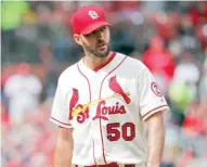  ?? AP ?? Cardinals pitcher Adam Wainwright can’t be cut more than 20 percent of his salary unless he becomes a free agent.