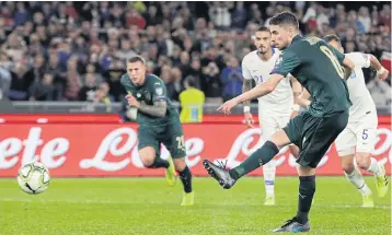  ?? AP ?? Italy’s Jorginho scores from the penalty spot during their Group J qualifier against Greece in Rome.