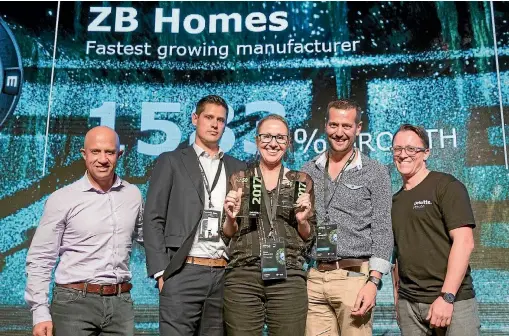  ?? SUPPLIED ?? ZB Homes Bay of Plenty director Zane Beckett (left), operations manager Fiona Flowerday and managing director Rik Flowerday celebrate their Deloitte Fast 50 Index win.