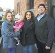  ?? Dan Tepfer / Hearst Connecticu­t Media ?? The Mendez family, arrested during a nowcontrov­ersial incident in October 2017, wait outside the Golden Hill Street courthouse in Bridgeport recently. From Left, Wanda Mendez, her 2yearold daughter, Sara Mendez and Carmelo Mendez