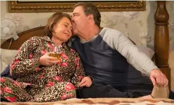  ??  ?? In this image released by ABC, Roseanne Barr, left, and John Goodman appear in a scene from the season finale of “Roseanne,” airing Tuesday, May 22. (ADAM rose/ABc VIA AP)