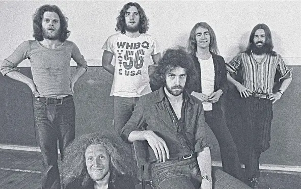  ??  ?? Molly, seated in the middle, with the other Average White Band members in Highgate London on July 19 1972.