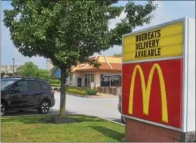  ?? MICHAEL SNEFF — DIGITAL FIRST MEDIA ?? The sign at the McDonald’s on South Trooper Road in Audubon lets customers know that it offers delivery through UberEATS. The chain has expanded its delivery in Montgomery and Chester counties.