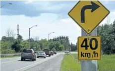  ?? CATHY PELLETIER/SPECIAL TO POSTMEDIA ?? A section of Allanport Road will be temporaril­y closed to through traffic until Sept. 1. Here, new speed limit reductions are in place on Regional Road 20.