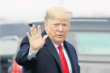  ?? ANDREW CABALLERO-REYNOLDS/GETTY-AFP ?? President Donald Trump boards Air Force One as he heads to the Army-Navy football game in Philadelph­ia on Saturday.