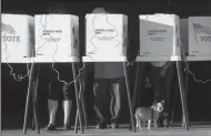  ?? GENARO MOLINA/LOS ANGELES TIMES ?? People cast their votes at the Los Angeles County Fire Department Lifeguard Operations in Venice on Nov. 5, 2016.