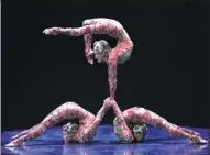  ?? PROVIDED TO CHINA DAILY ?? Three contortion­ists from Mongolia perform in Singapore on Wednesday for Cirque du Soleil’s touring show in Asia, which will be introduced to China on Oct 1 in Shanghai.