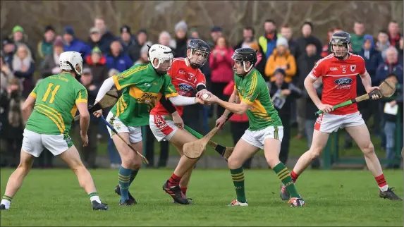  ??  ?? Lixnaw’s Colin Sheehy closes in on Charlevill­e’s Jack Meade during the Munster Intermedia­te Hurling Championsh­ip semi-final in Hermitage Park, Lixnaw on Saturday Photo by Domnick Walsh