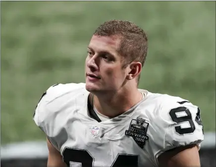  ?? ASSOCIATED PRESS FILE ?? In this Nov. 29, 2020, photo, Las Vegas Raiders defensive end Carl Nassib leaves the field after a game against the Falcons in Atlanta. On