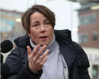  ?? NAncy lAnE phOTOs / hErAld sTAFF FilEs ?? TOP EARNER: Maura Healey announces her run for governor during a campaign stop in Maverick Sq. on January 20, 2022.