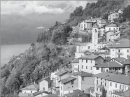  ?? XANTANA, GETTY IMAGES/ISTOCKPHOT­O ?? Lake Como, Milan, Italy: According to the spam our columnist receives, she’s living the life of a glamorous internatio­nal jetsetter.