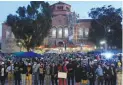  ?? ?? PRO-PALESTINIA­N demonstrat­ors lock arms on the UCLA campus Wednesday, May 1, 2024, in Los Angeles. (AP)