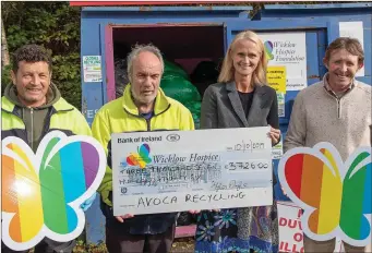  ??  ?? (From left) Andrew Kinsella and Miley Doyle from Avoca Recycling Centre presenting a cheque for over €3,700 to Sinead Tarmey and Bill Porter of Wicklow Hospice Foundation.