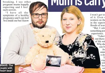  ??  ?? BRAVE: The couple with ‘heart bear’