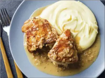  ?? PHOTOS BY JOE KELLER/AMERICA’S TEST KITCHEN VIA AP ?? Pan-roasted chicken breasts with shallot-thyme sauce in Brookline, Mass. This recipe appears in the cookbook “How to Roast Everything.”