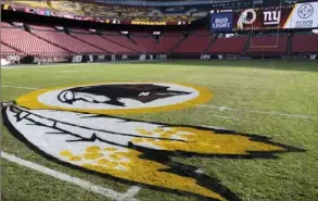  ?? Mark Tenally/Associated Press ?? The Washington Redskins logo is seen on FedEx Field prior to an NFL game in Landover, Md. Washington team officials announced last week that the nickname and logo will be dropped after sponsors threatened to withhold their support.