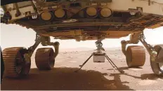  ?? AFP file ?? ■ NASA’s Ingenuity Mars Helicopter before dropping from the belly of the Perseveran­ce rover on March 30 this year..