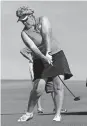  ??  ?? LeeAnn Fairlie plays in the first round of match play at the Women's Southern Golf Associatio­n tournament at Gaillardia Country Club on June 3, 2014. [OKLAHOMAN ARCHIVES]