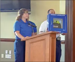  ??  ?? Redmond Regional Medical Center EMTs brought along an AED to show off to the Rockmart City Council as they made a donation to the city in recent days.