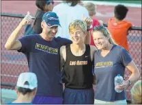  ?? COURTESY PHOTO ?? Jeremy Kain, center, of Scotts Valley, celebrates with his parents, Peter, left, and Shari, after the event in Los Gatos on July 13.