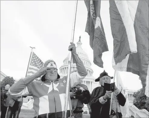  ?? ROD LAMKEY/GETTY ?? Members of the Tea Party Patriots rally on the west lawn of the Capitol in Washington on Election Day 2010. Cries from the right for fiscal constraint have faded.