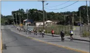 ?? SUBMITTED PHOTO — JARED COFFIN ?? Riders head out on the 13th annual Brake the Cycle of Poverty Benefit Bike Ride for Friend Inc. Community Services on Aug. 13.