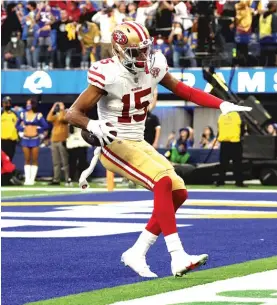  ?? HARRY HOW/GETTY IMAGES ?? Niners receiver Jauan Jennings scores on a 14-yard touchdown pass from Jimmy Garoppolo with 26 seconds remaining to force overtime.