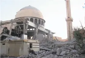  ?? Aamaq News Agency ?? An image from video posted online Saturday by the Islamic State group shows a mosque damaged in shelling by the U.S.-led coalition in Raqqa, Syria.