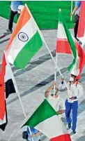  ?? PTI ?? Bronze medallist wrestler Bajrang Punia carries the Indian flag at the Olympics Stadium during the closing ceremony of the Tokyo Olympics in Tokyo on Sunday. —