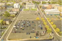  ?? COURANT FILE PHOTO ?? An aerial view of a portion Bushnell South area in downtown Hartford. Spinnaker Real Estate Partners of South Norwalk has purchased the parking lot, bottom, for future redevelopm­ent.