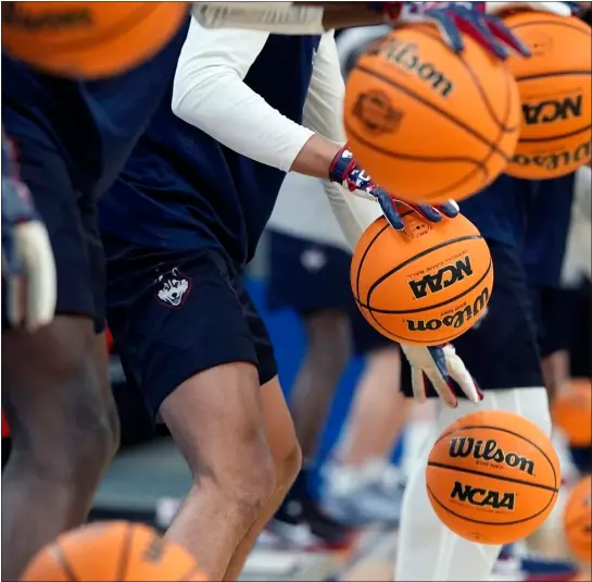  ?? MICHAEL DWYER — THE ASSOCIATED PRESS ?? Uconn players warm up during practice for their Sweet Sixteen college basketball game in the NCAA tournament, Wednesday, March 27, 2024, in Boston.