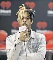  ?? MEDIAPUNCH/IPX/AP ?? XXXTentaci­on was fatally shot on June 18 as he left RIVA Motorsport­s in Deerfield Beach.