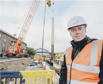  ?? ?? Cllr Kevin Johnston inspects progress at Panns Quay East.