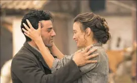  ??  ?? Oscar Isaac loves two women, including Ms. Le Bon, in “The Promise.”