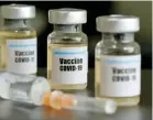  ??  ?? The COVID-19 vaccine trial was put on hold due to suspected serious adverse reaction in a study participan­t.