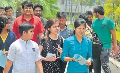  ??  ?? Above & below: Aspirants coming out of the examinatio­n centre near Bijnor Road on Sunday after appearing in the JEE Advanced 2018 examinatio­n.